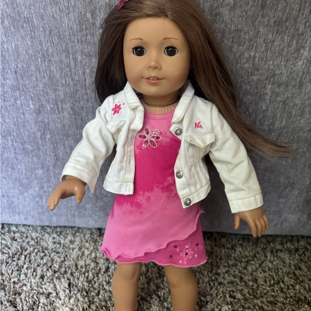 American Girl Doll with Pink Dress and White Jacket